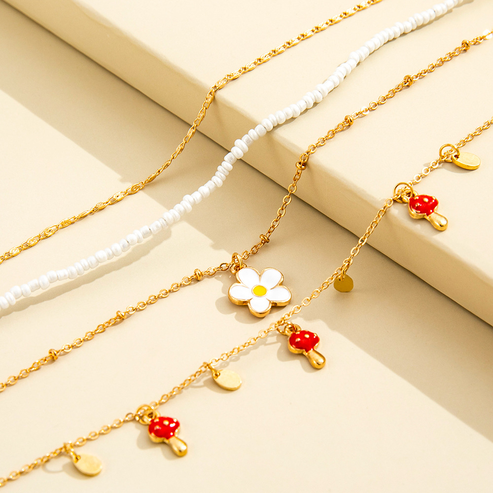European and American new simple mushroom small pendant white flower pendant four-piece anklet