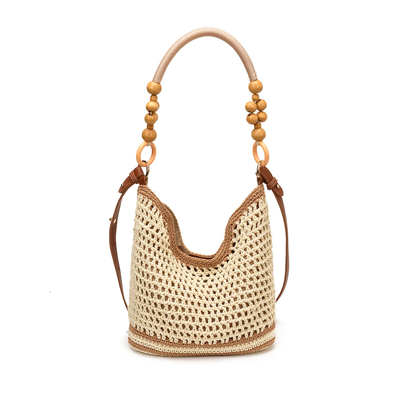 Bolsas de gran capacidad de tejido hueco para mujeres 2026 nuevas bolsas de playa de vacaciones en la playa de viaje nicho brazo Tote image 12