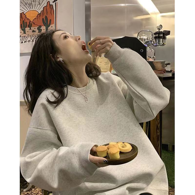 丸首の衛衣の灰色の女性の秋冬の高級感の小さい大衆のデザイン感のゆったりしている大きいサイズの純色の韓国版の怠惰な風の衛衣