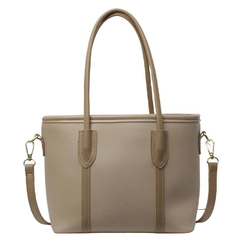 Bolso de mano de tendencia coreana para mujeres verano 2024 nuevo tipo de bolso de hombro para viajar al trabajo bolso de cubo de gran capacidad