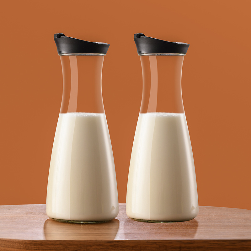 Gran capacidad de vidrio de boca ancha botella de jugo de fruta fría botella de jugo de fruta doméstica botella de bebida vacía de leche