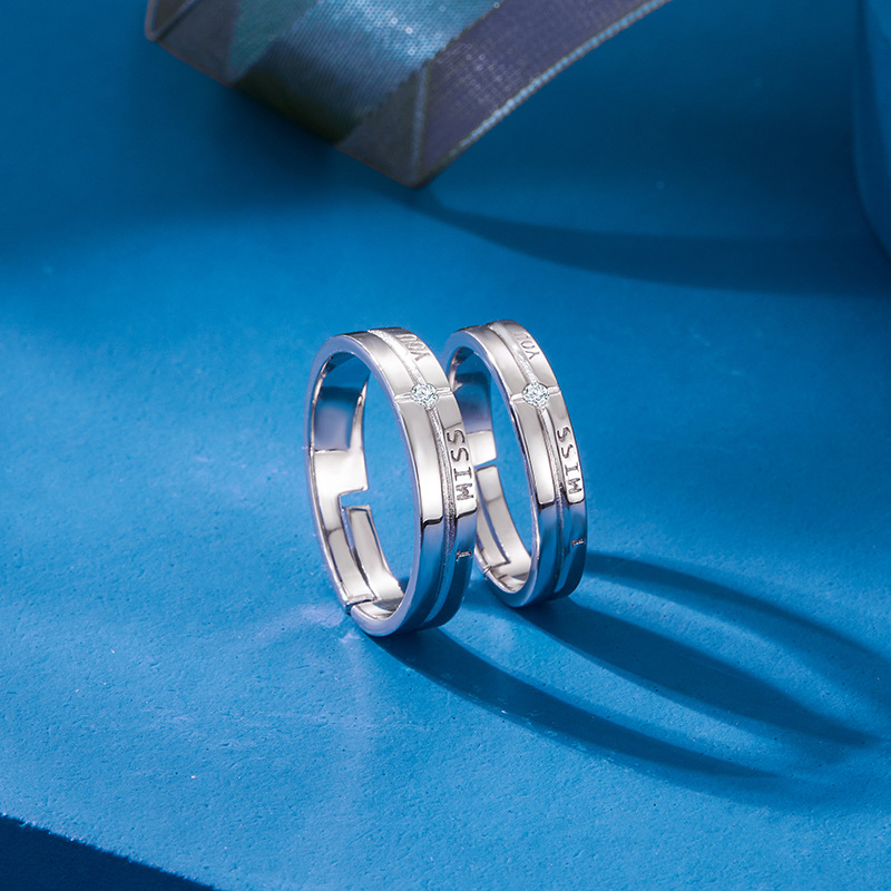 S925 anillo de pareja de plata esterlina Corea del Sur elegante carta con incrustaciones de circón anillo de diseño de nicho abierto para hombres y mujeres