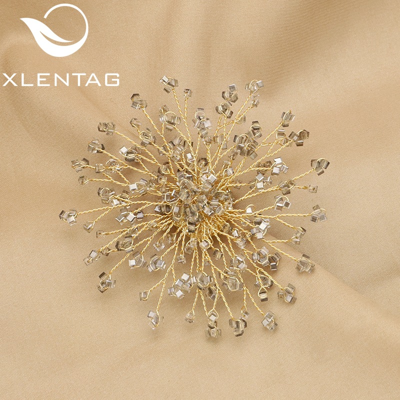 Broche de perlas naturales de alto grado nicho transparente gris copo de nieve traje broche de gama alta retro girasol al por mayor