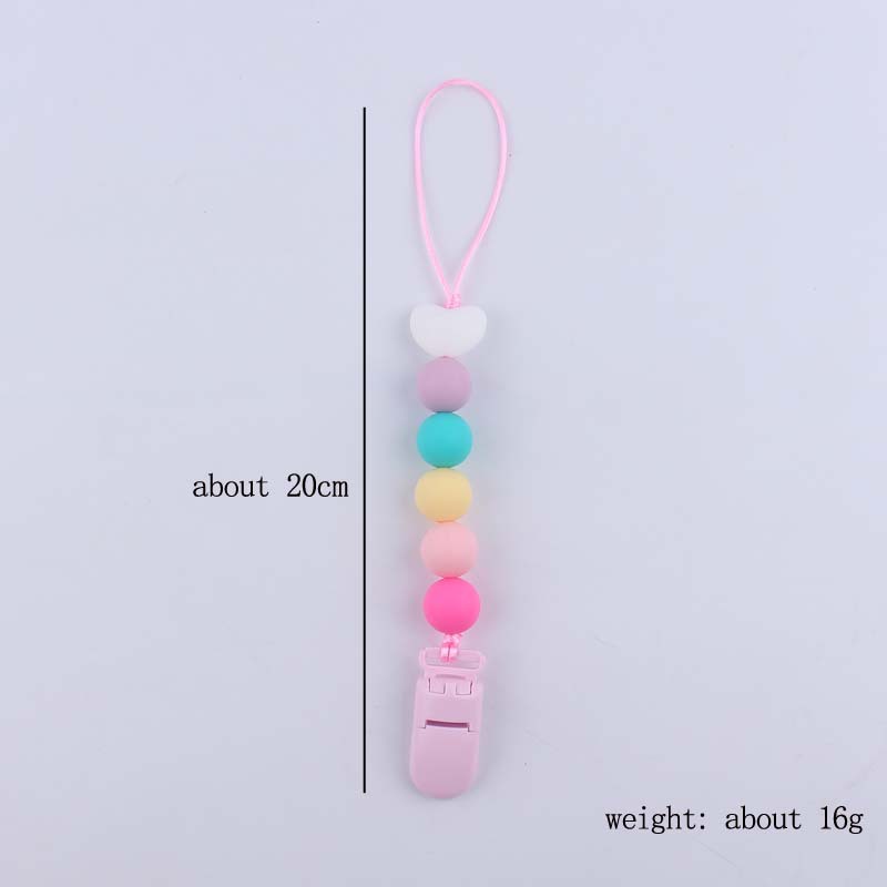 Nuevo bebé suministros de dibujos animados amor silicona DIY creativo macaron color serie mordedura cola molar pezón