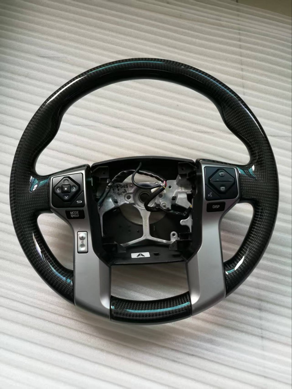 Suitable for Toyota Land Cruiser LC150, Tundra, Sequoia, and Prado 4.0; carbon fiber steering wheel modification and customization