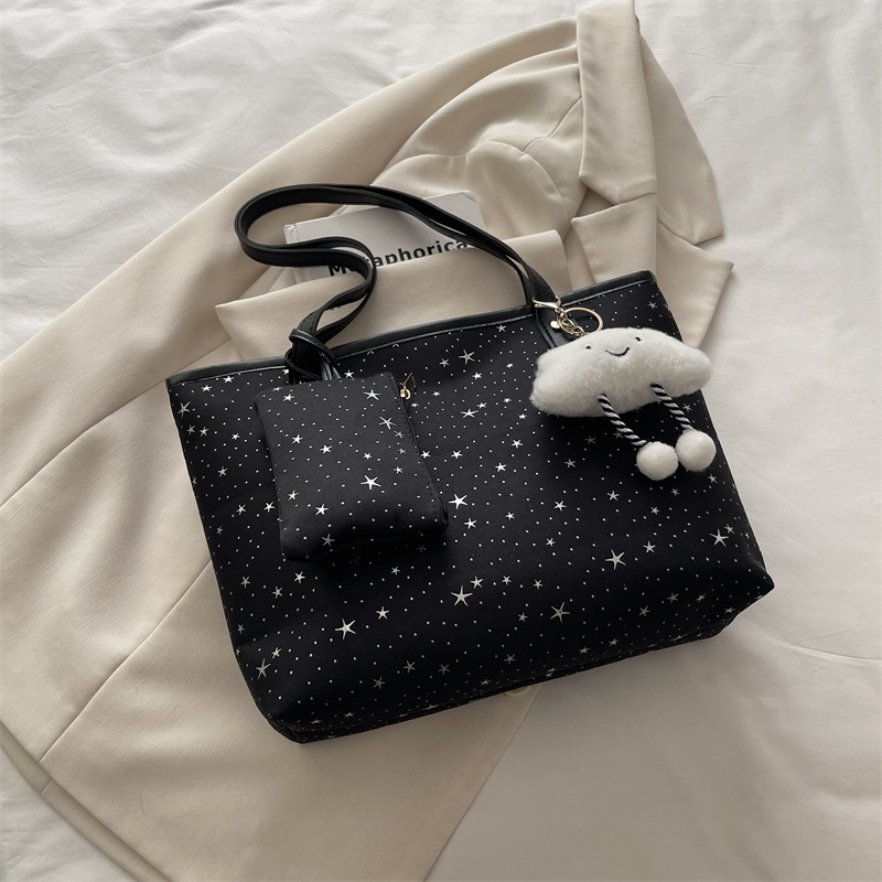 2026 primavera nueva bolsa de hombro de gran capacidad bolsa de brazo universal tendencia transfronteriza dulce viento bolso de mano bolso de mujer
