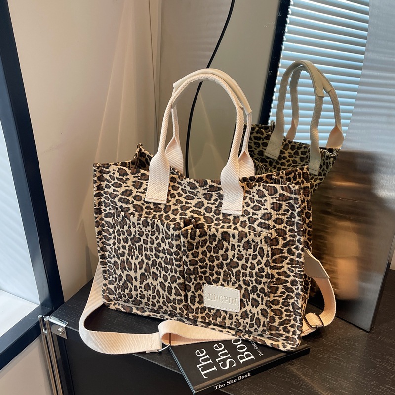 Leopardo tela bolsa de tela para mujeres bolsa de gran capacidad 2024 nuevo estilo relajado sensación de mano viaje bolsa de hombro de mamá