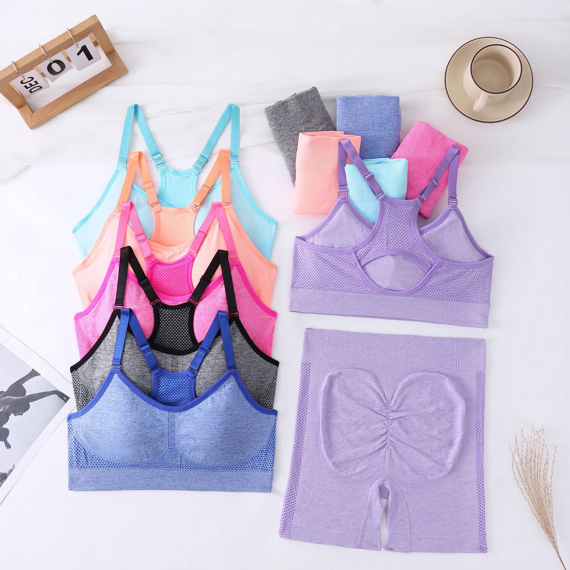 Nuevo traje de yoga sin costuras transfronterizo de color sólido en forma de trabajo diseño hueco sexy moda traje deportivo pantalones cortos