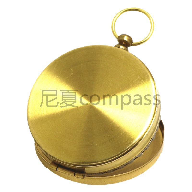 En stock G50 cobre puro flip brújula norte aguja al aire libre multi-funcional aguja de metal con reloj de bolsillo luminoso tipo