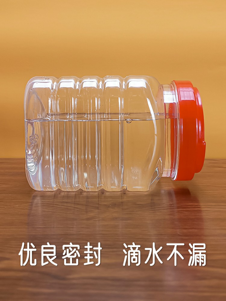 Botella de plástico Baosheng Tarro de plástico sellado Botella de miel con tapa PET Paquete transparente de cuatro cuadrados de grado alimenticio de gran diámetro