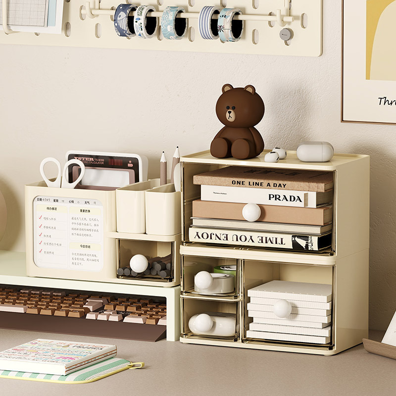 La Caja de almacenamiento de estilo cajón de viento crema ins, los suministros del dormitorio estudiantil de la Mesa se apilan en varias capas y la Caja de almacenamiento a prueba de polvo.
