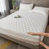 Waterproof bed, white sheet