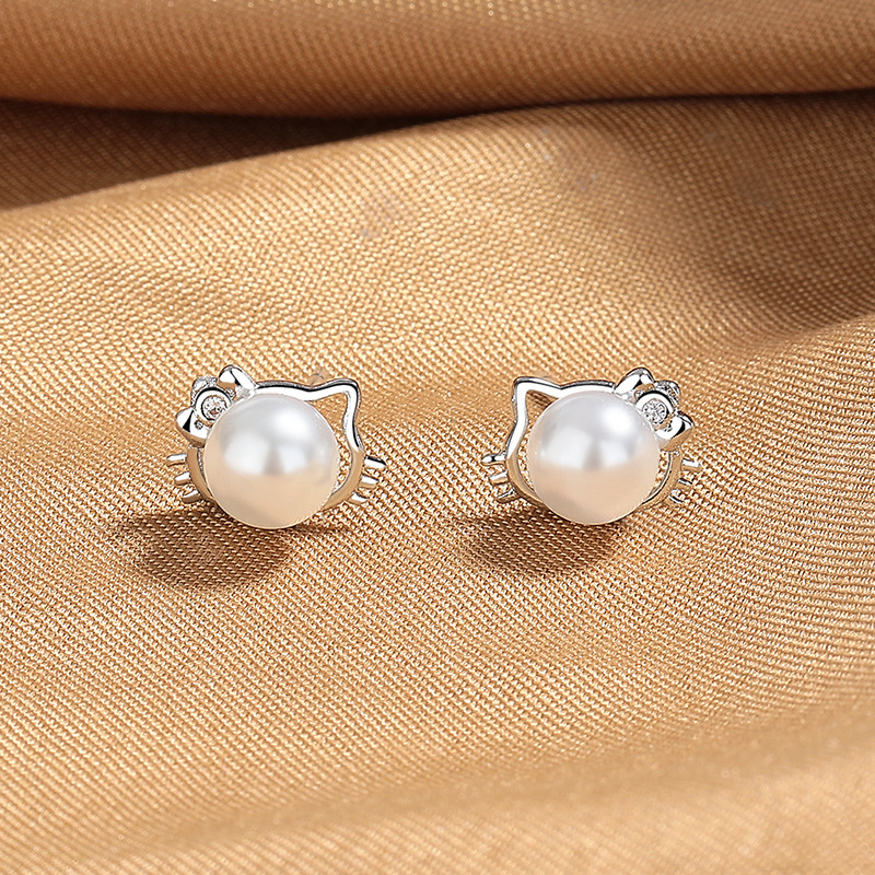Fashionable cute small sophisticated demi-season earrings from pearl