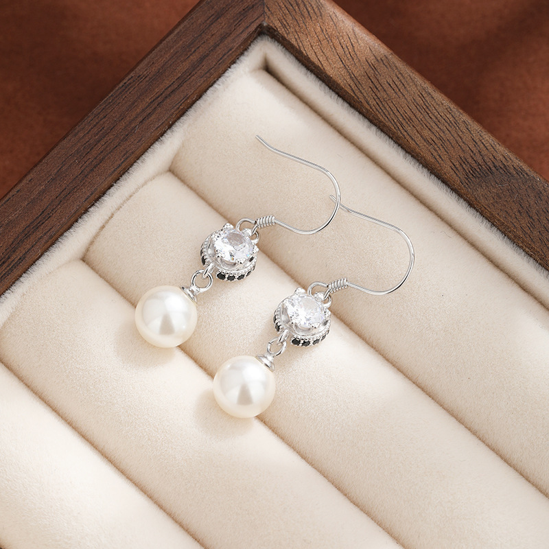 Pendientes de perla de imitación de plata de ley 925 para mujer 2025 nuevos pendientes largos de circón con incrustaciones Pendientes de alta gama de moda de lujo ligero