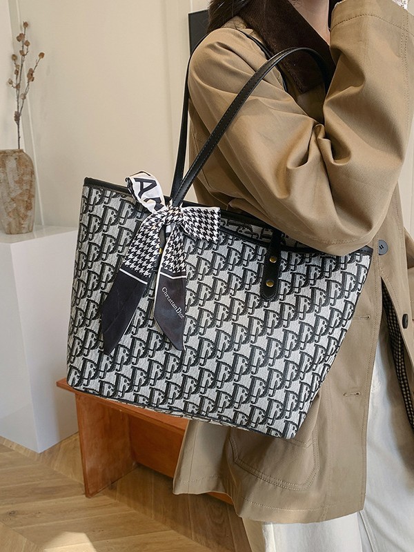 Bolso para mujeres 2025 nuevo retro alta textura versátil bolso de hombro impresa de gran capacidad de letras bolso de viaje