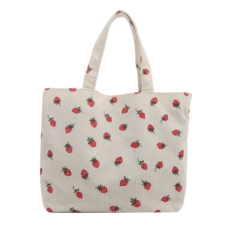 2026 nuevo bolso de transporte de gran capacidad impresión de fresas bolso de hombro de estudiantes