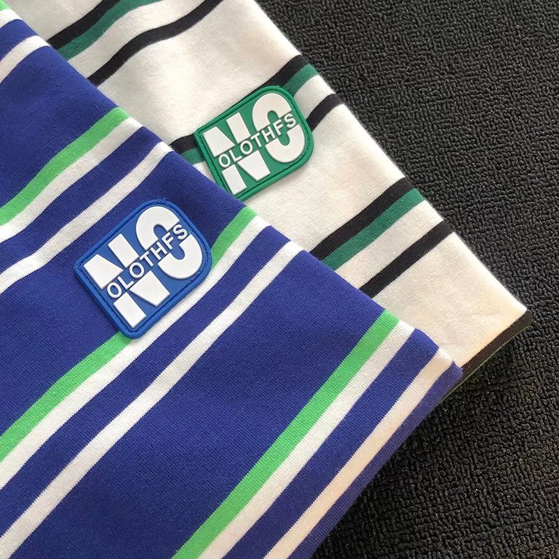 Camiseta de rayas de los hombres de verano 2022 nuevo diseño sentido nicho flojo retro Hong Kong estilo ins moda estudiante de manga corta top