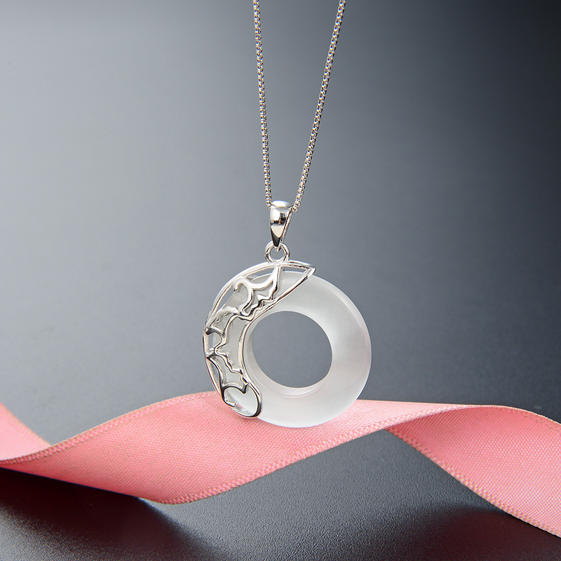 925 plata esterlina collar de estrellas sol y luna nicho femenino simple sensación de alto nivel de la vida del año perteneciente a la seguridad del dragón colgante para niños