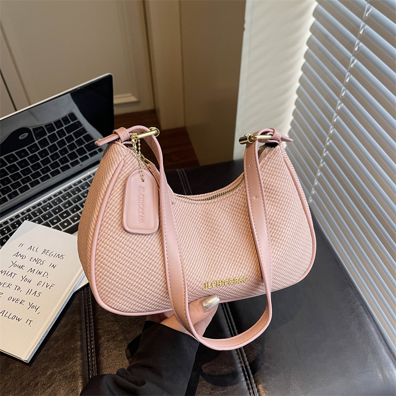 Bolso transfronterizo para mujeres nuevo estilo portátil bajo la axila simple universal moda extranjera mochila de hombro venta caliente