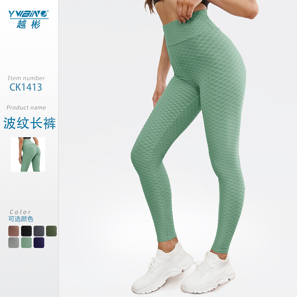 ¡En stock! Europa y América popular melocotón hip lifting onda patrón jacquard yoga burbuja pantalones de cintura alta medias deportivas para las mujeres