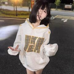 李火火の民族風の編み物は布を貼って刺繍します。