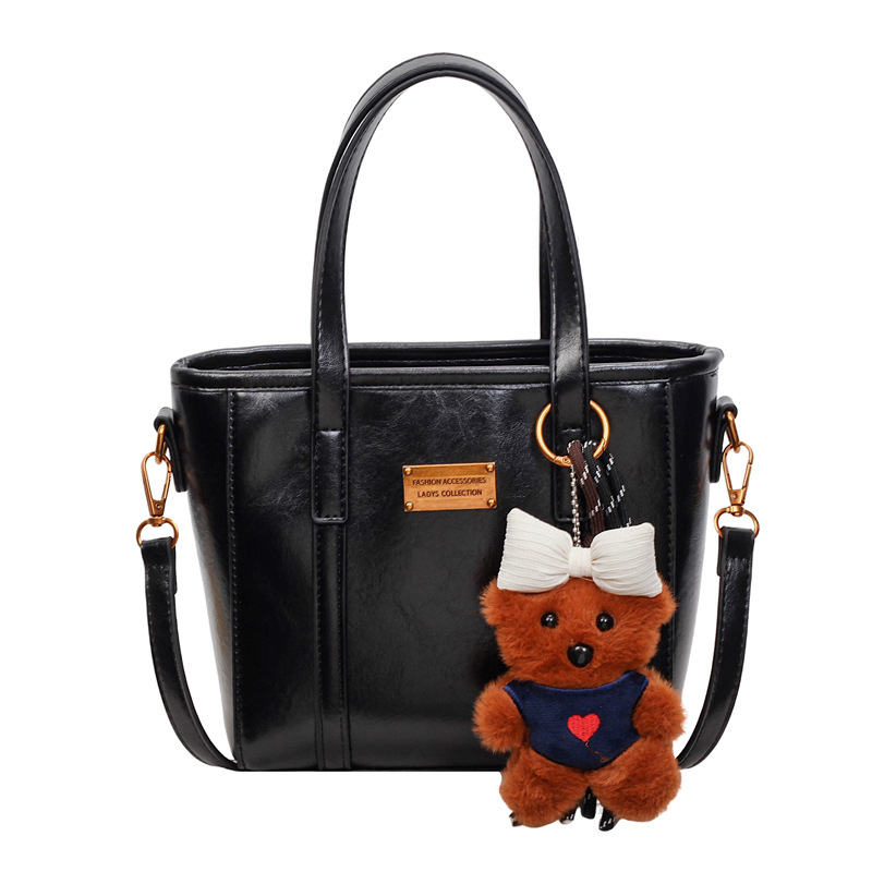 Bolso de mano retro de alto nivel, bolso de balde de agua universal, mujer, otoño y invierno 2025, nuevo tipo de bolso de hombro de moda, bolso de transporte de viaje