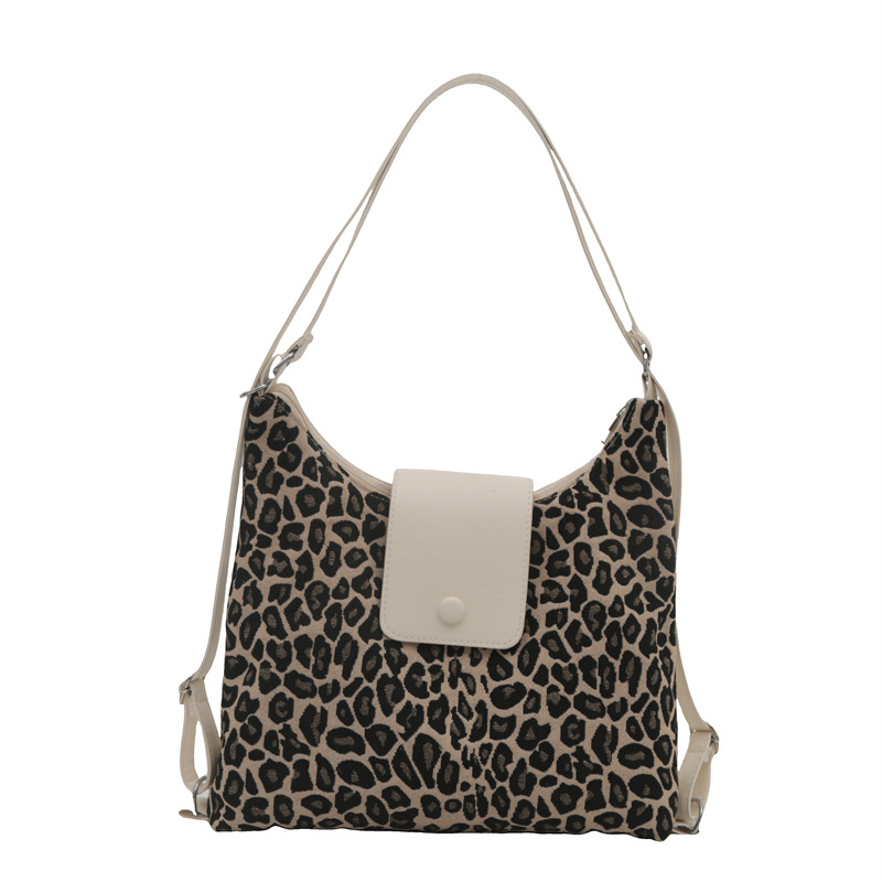 Mochila roja francesa retro para mujeres 2024 nueva moda extranjera bolsa de tres usos de gran capacidad mochila de cuero suave