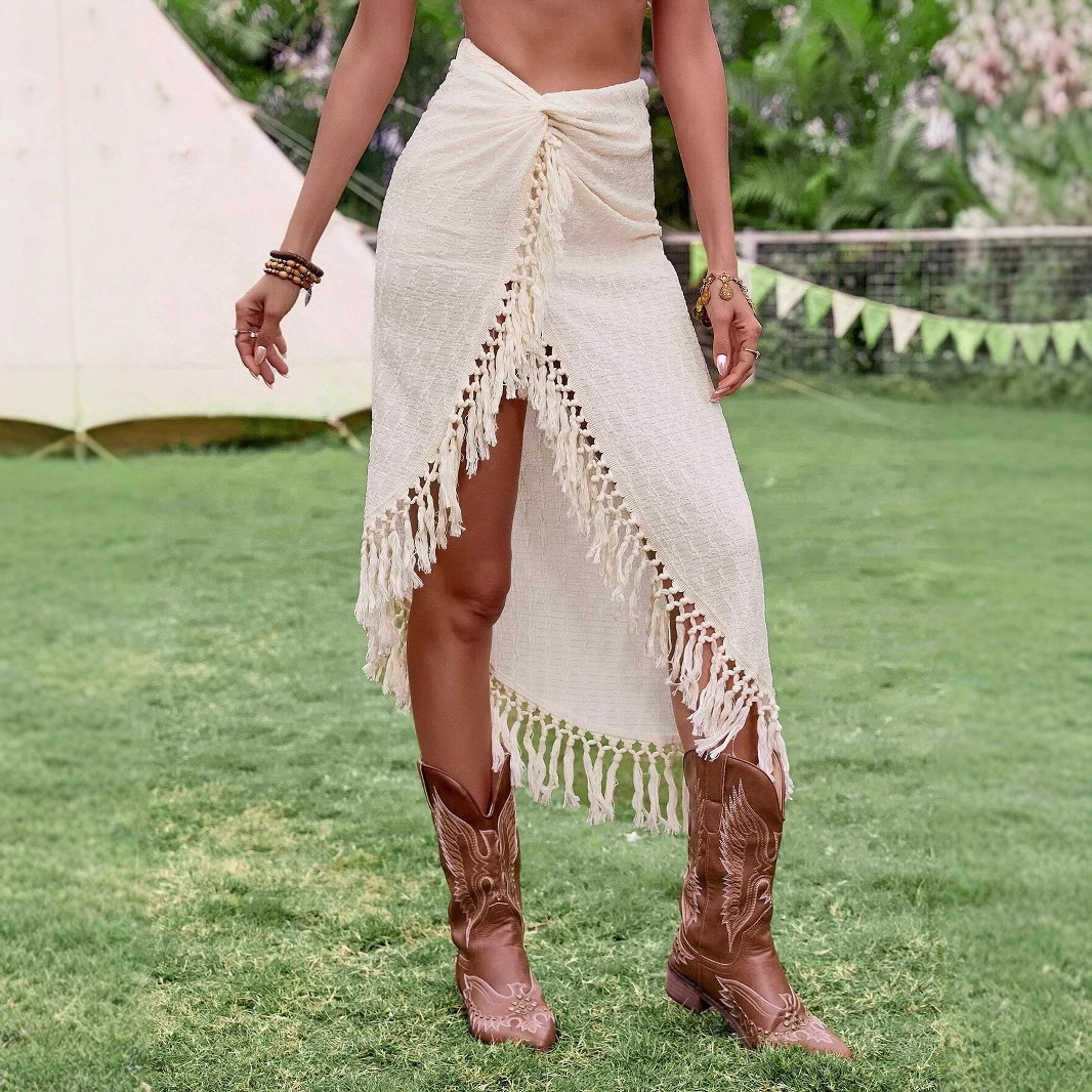 2025 Amazon трансграничная европейская и американская внешняя торговля новая женская одежда с кисточками на пляже с полыми нерегулярными юбками