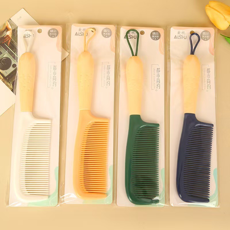 Nuevo paquete de impresión de cuerda de colgante independiente de trigo rollo de peinado de plástico peinado de belleza tienda de dos yuanes asequible