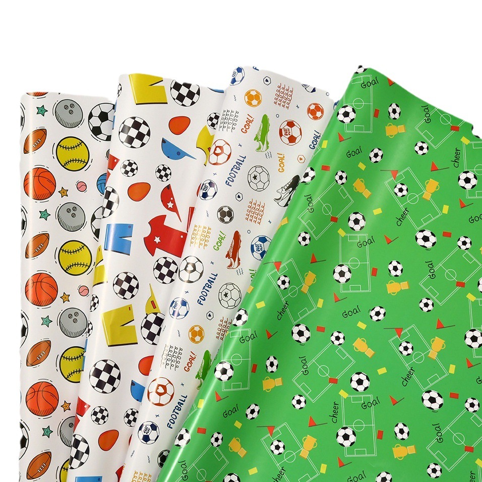 Nuevo papel de regalo de dibujos animados transfronterizo al por mayor Papel de embalaje de baloncesto de fútbol del Día de los niños en stock