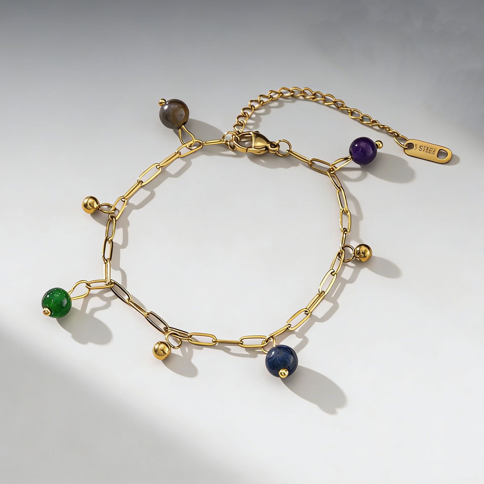 Nuevo colgante de piedra de color de verano pulsera de tobillo de lujo ligero nicho de oro 18 quilates diseño de moda de cadena de sentido de pie Europa y América transfronteriza
