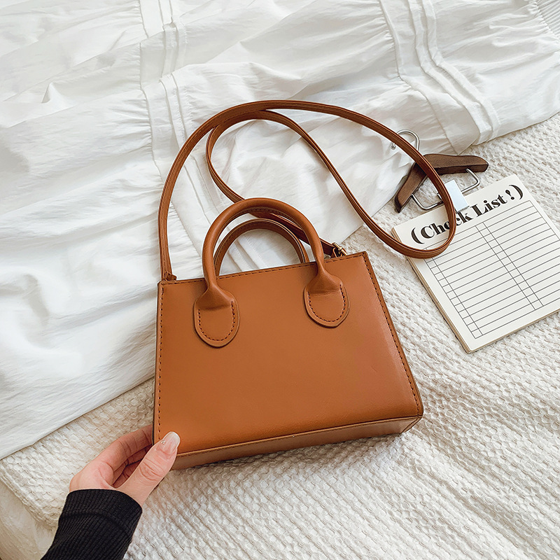 Bolso de mensajero femenino con textura de línea de moda 2025 nuevo bolso femenino portátil de moda de todo fósforo bolso cuadrado pequeño de gran capacidad de cercanías