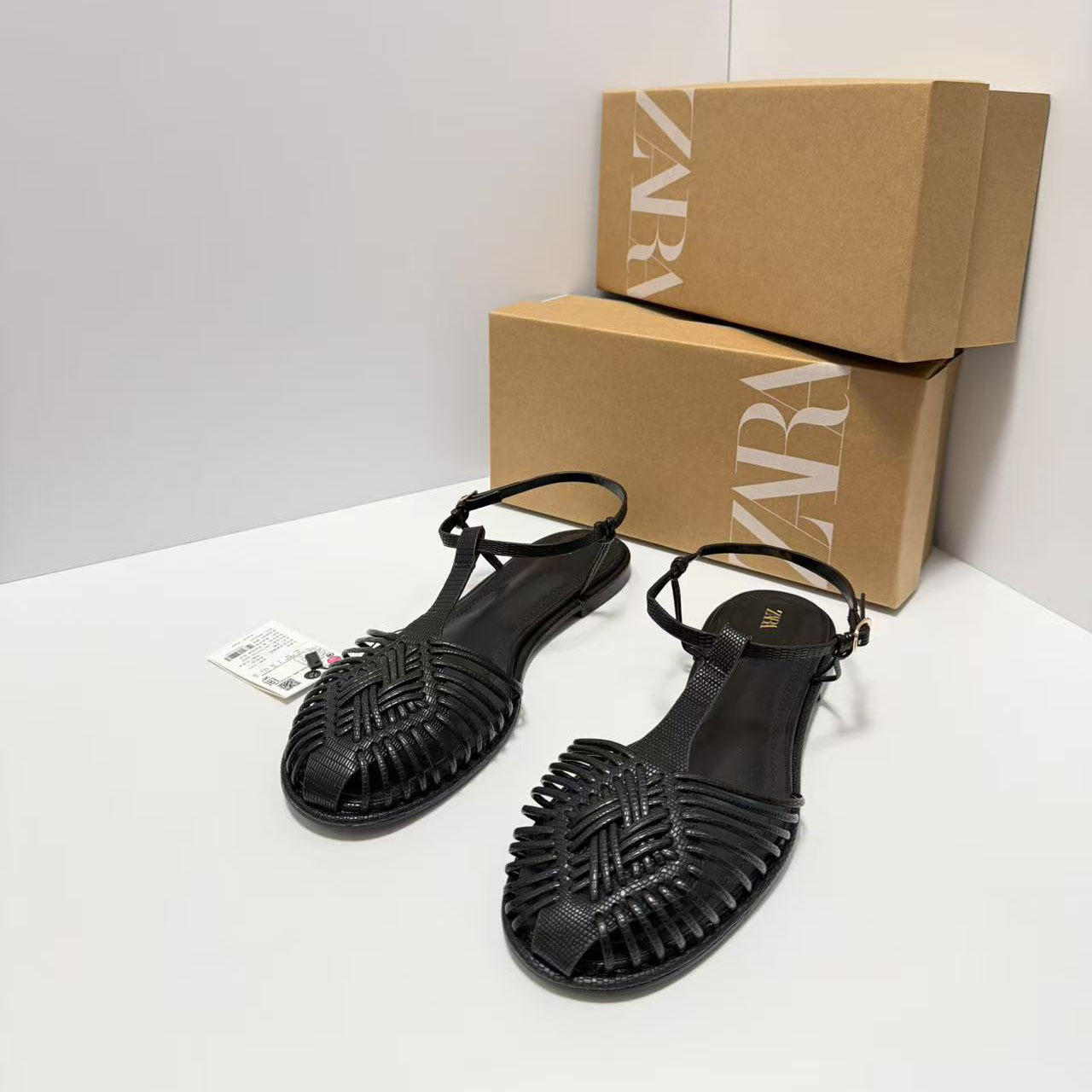 ZA2026 nuevo retro cabeza redonda plana zapatos romanos tejidos huecos hebilla de moda sandalias de cabeza