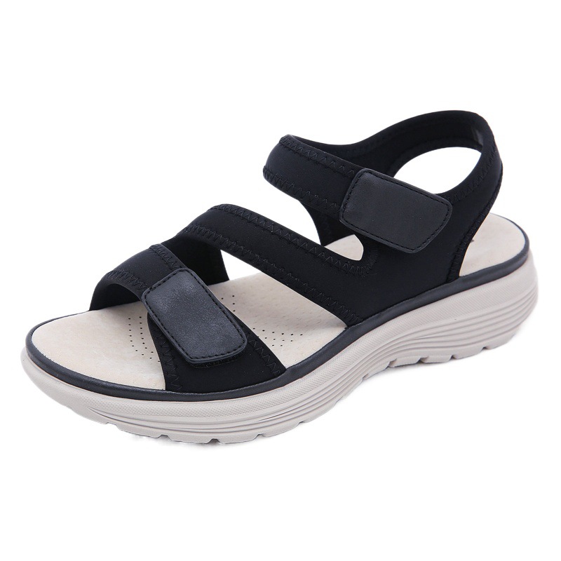 Verano 2025 nuevas sandalias de cuero estilo deportivo para mujer tacón de cuña velcro ligero pantuflas de talla grande para mujer