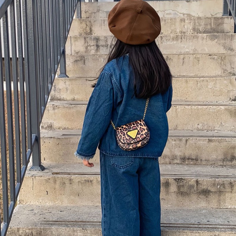 Bolsos de hombro coreanos para niños y niñas de moda con patrón de leopardo extranjero mini mochila para bebés nueva cadena transfronteriza bolso para niños