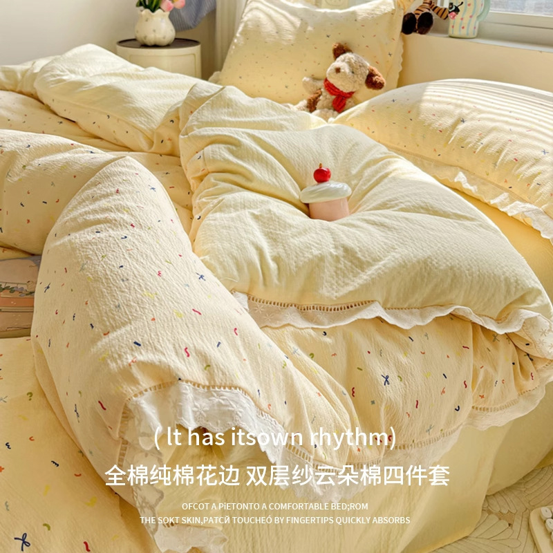 Una cama de hilo de doble capa de estilo crema de cuatro piezas de algodón puro encaje de algodón funda de edredón funda de edredón sábana juego de tres piezas