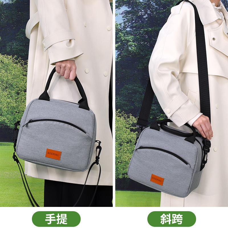 Nuevo tipo de bolsa de almuerzo portátil transfronteriza se puede llevar de lado, bolsa de aislamiento impermeable a prueba de aceite, oficina de gran capacidad con bolsa de almuerzo de comida