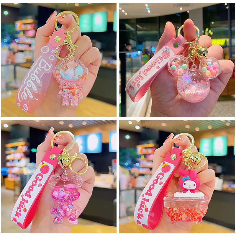 Spaceman quicksand bottle floating in oil keychain pendant wholesale acrylic small gift school bag pendant key chain