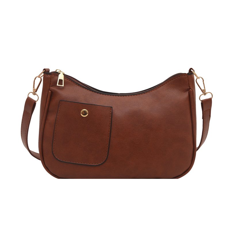 Bolso de mujer retro coreano personalidad 2025 bolso de media luna de hombro de estilo nuevo estilo francés bolso de diseño de nicho bajo la axila
