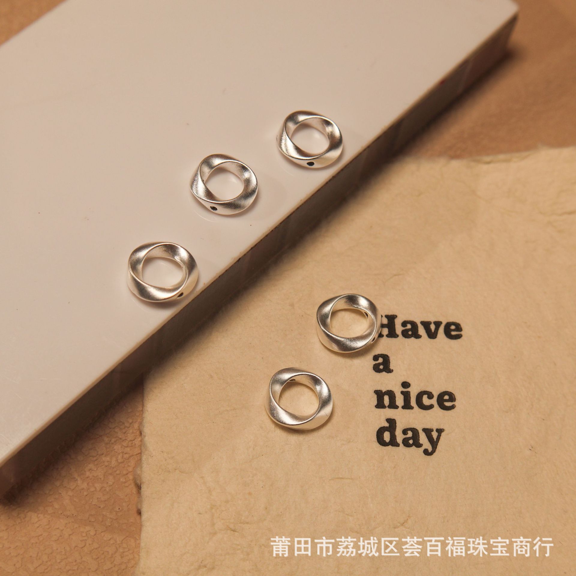 Pure silver s999 Möbius 3D hard silver accessory, hollow fashion niche light luxury ins handmade silver spacer bead accessory