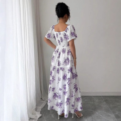 藤の花の雰囲気とエレガントなドレスの女性のフレンチスタイルのプリントロングスカートヨーロッパとアメリカ
