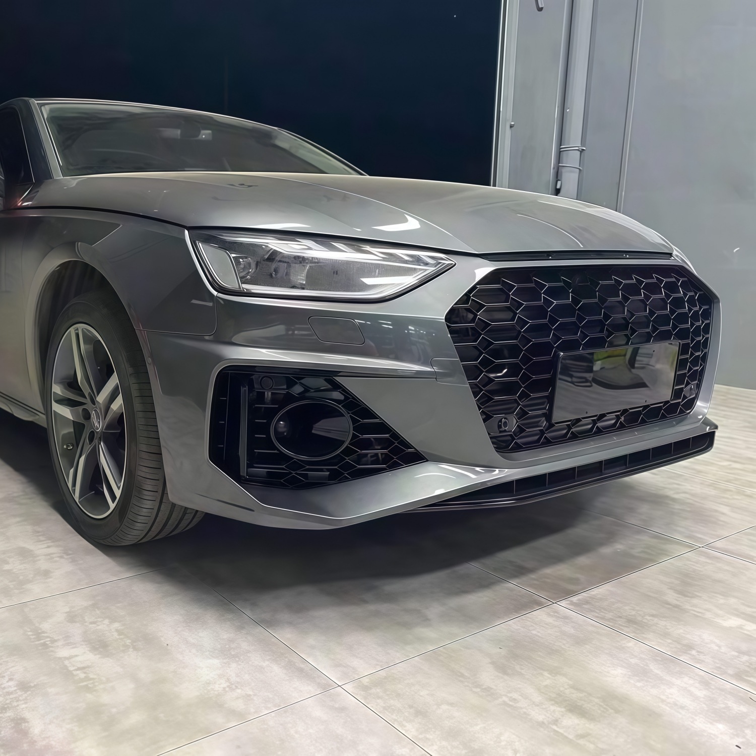 20-22 models suitable for Audi A4L, modified with an RS4-style front bumper, front grille, and front fascia