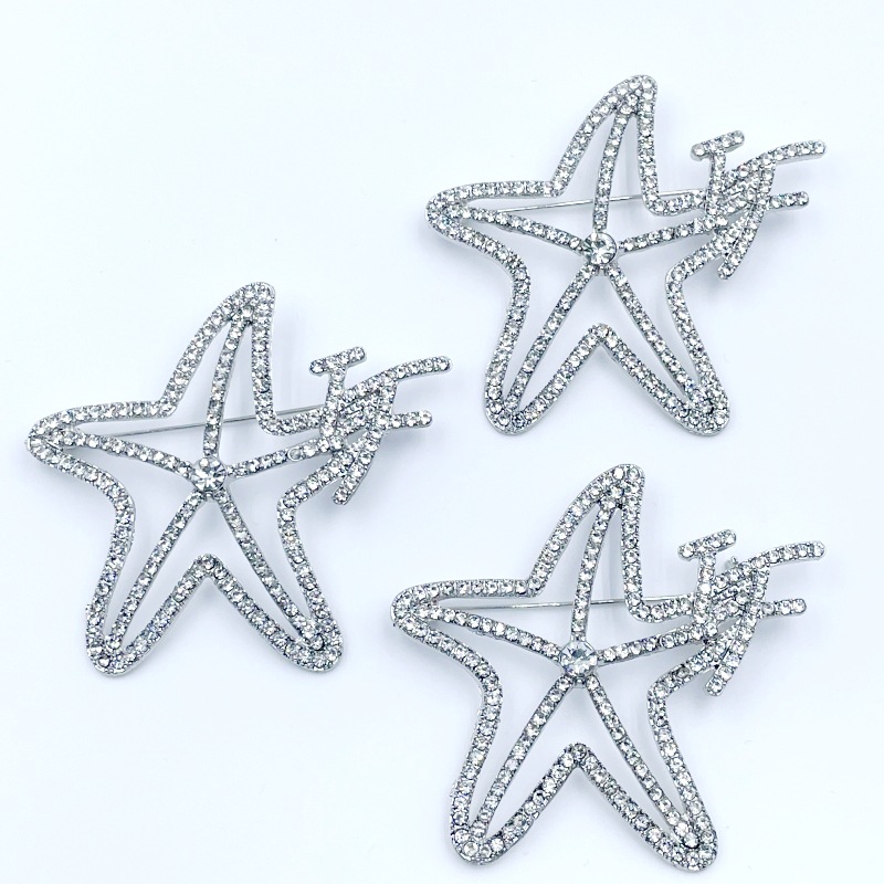 Venta caliente europea y coreana pin luz lujo moda viajero versátil estrella de cinco puntas broche Inglés estilo Chanel ramillete personalizado Accesorios