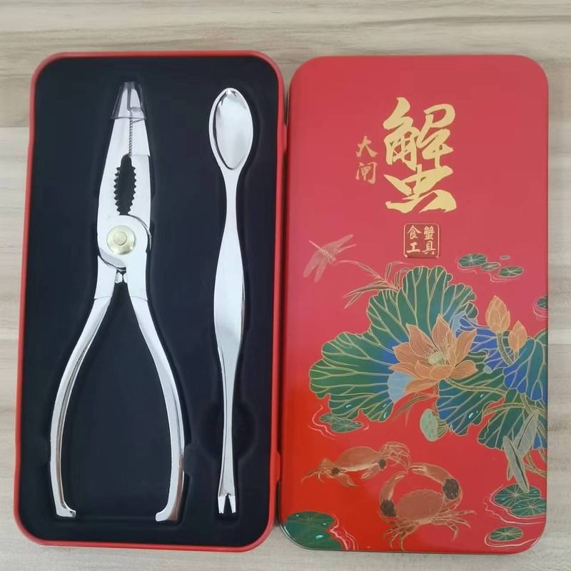 工場の現物のステンレスのカニのはさみの工具の2セットの海鮮のレストランはカニの用具のホテルのカニのスプーンを食べて卸売りします。|undefined