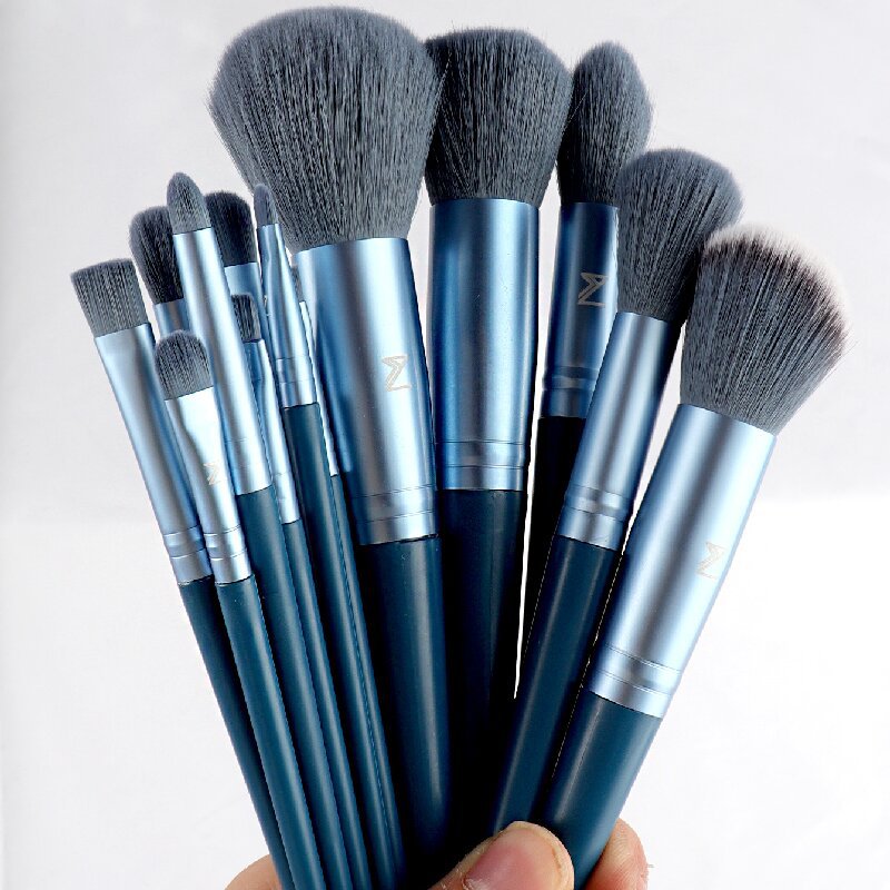 13 conjuntos de cepillo de maquillaje con bolsas de lana azul portátiles de cabello suave de gran tamaño Xiyintemu un cabello