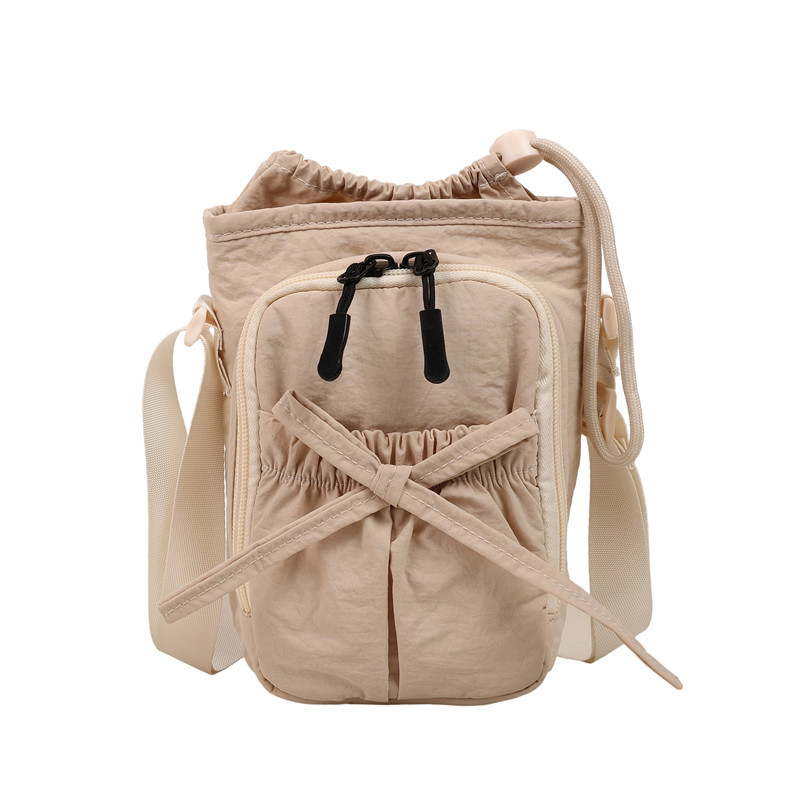 Bolso de teléfono móvil de moda coreana 2025 verano nuevo bolso femenino lindo lazo bolso de hombro bolso de mensajero de lona casual