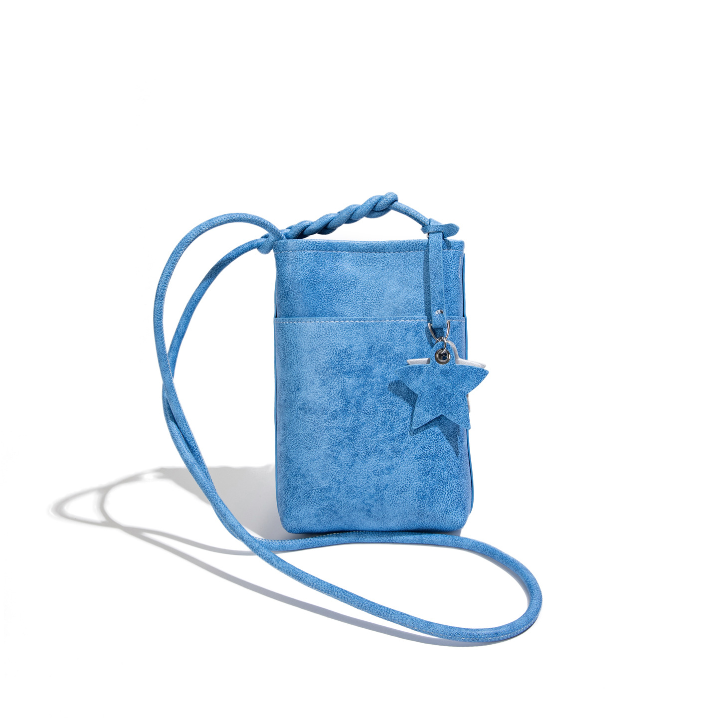 La versión coreana de nicho de color sólido bolso de teléfono móvil para mujeres 2026 verano nuevo pequeño y ligero bolso de hombro pequeño