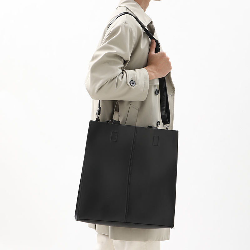 Korean version of fashionable PU leather shoulder bag, simple commuter men's and women's tote bag, square vertical crossbody large-capacity handbag_voghion.com