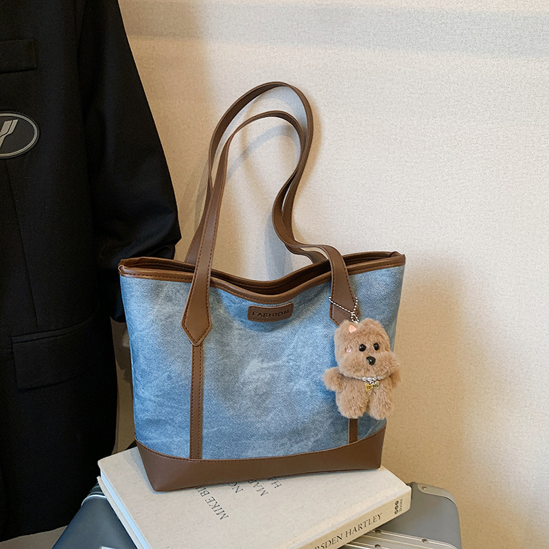 Bolsas de viaje de moda de gran capacidad de mujeres otoño 2025 nueva bolsa de hombro de estilo extranjero bolsas de mano universitarias