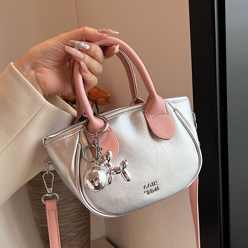 Alta sensación de contraste bolsos pequeños para mujeres 2024 nuevo verano popular bolsa de mensajero versátil Super Fire bolsa de cubo de mano